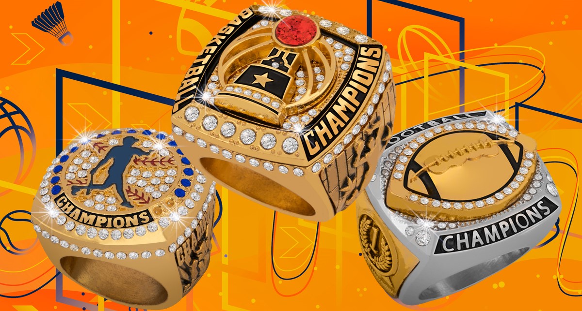 Three gold and diamond custom championship rings for different sports.